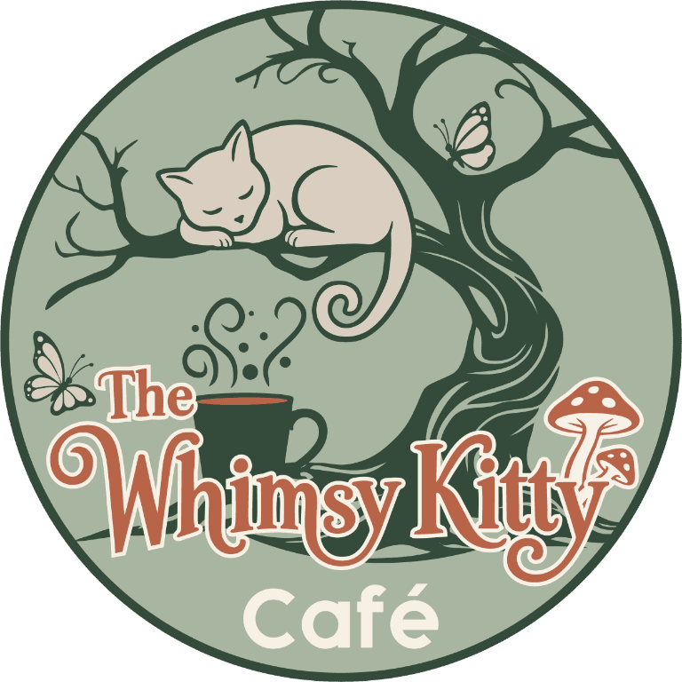 The Whimsy Kitty Café round logo with a cat resting in a tree